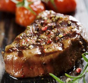 Steak with roma tomatoes